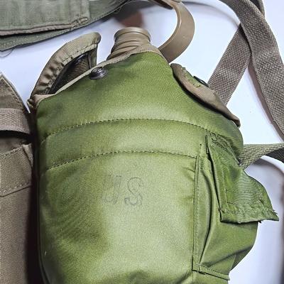 Military issued canteen with suspenders and ammunition bag
