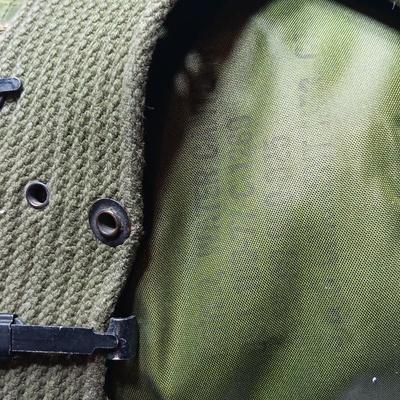 Military issued canteen with suspenders and ammunition bag