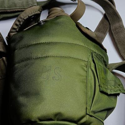 Military issued canteen with suspenders and ammunition bag