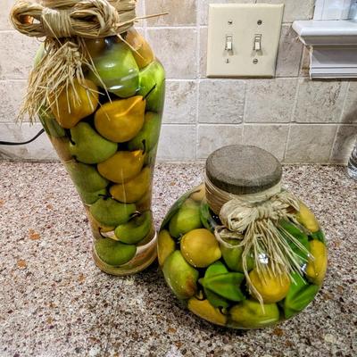 2 Large glass bottled pear jars.