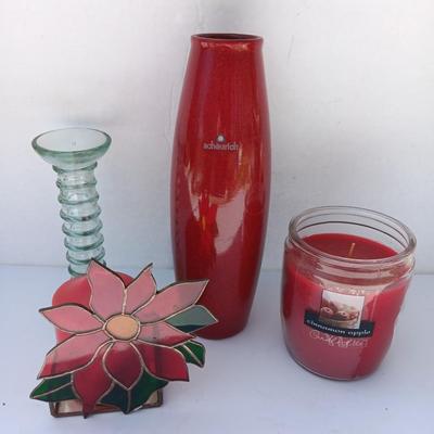 Red Scheurich Vase with Poinsettia candle holder clear vase and an unburned scented candle