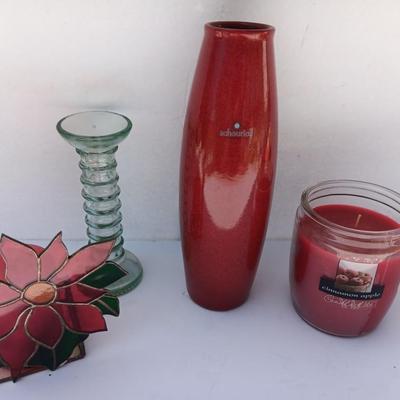 Red Scheurich Vase with Poinsettia candle holder clear vase and an unburned scented candle