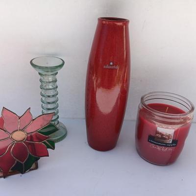 Red Scheurich Vase with Poinsettia candle holder clear vase and an unburned scented candle