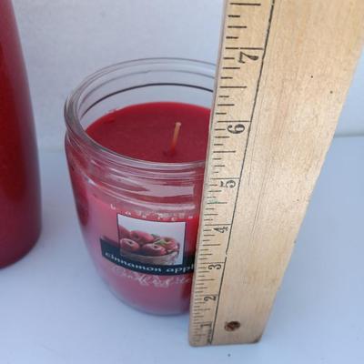 Red Scheurich Vase with Poinsettia candle holder clear vase and an unburned scented candle