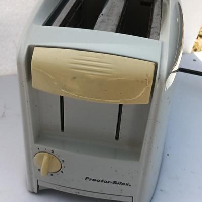 Small Kitchen Appliances - White Westinghouse Hand mixer and a Proctor Silex toaster