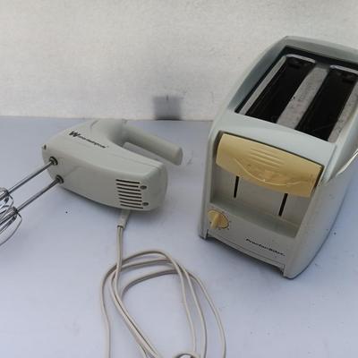 Small Kitchen Appliances - White Westinghouse Hand mixer and a Proctor Silex toaster