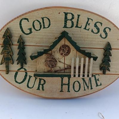 God Bless our home wall hanging with Precious Moments Christmas plate and small stained glass.
