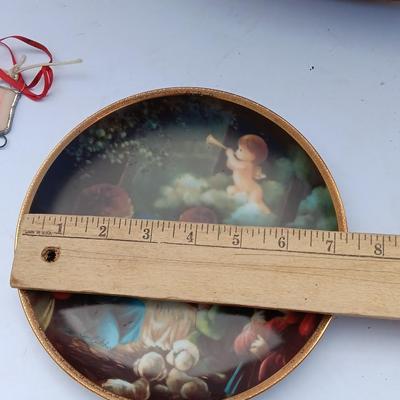 God Bless our home wall hanging with Precious Moments Christmas plate and small stained glass.