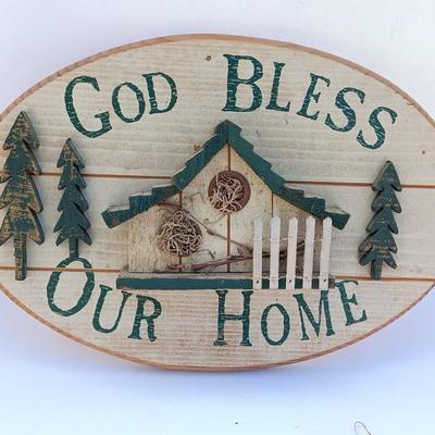 God Bless our home wall hanging with Precious Moments Christmas plate and small stained glass.