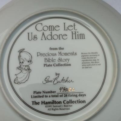 God Bless our home wall hanging with Precious Moments Christmas plate and small stained glass.