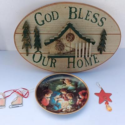 God Bless our home wall hanging with Precious Moments Christmas plate and small stained glass.