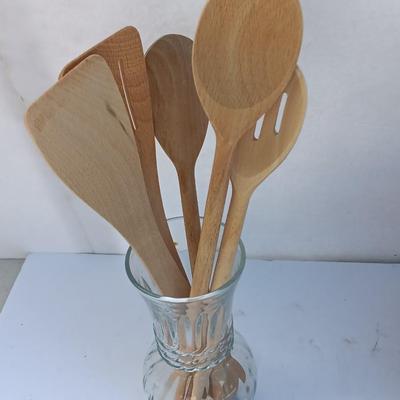 Wooden recipes box with vase of wooden utensils and a Pleasures from the good Earth cookbook
