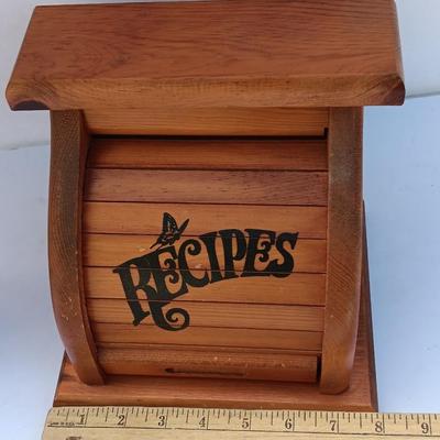 Wooden recipes box with vase of wooden utensils and a Pleasures from the good Earth cookbook