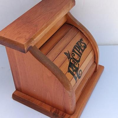 Wooden recipes box with vase of wooden utensils and a Pleasures from the good Earth cookbook