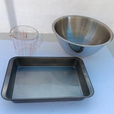Large stainless bowl - Fire King measuring glass - and a cake pan