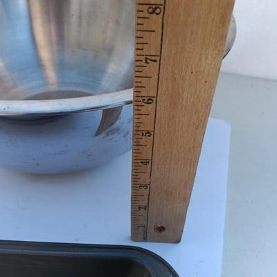 Large stainless bowl - Fire King measuring glass - and a cake pan