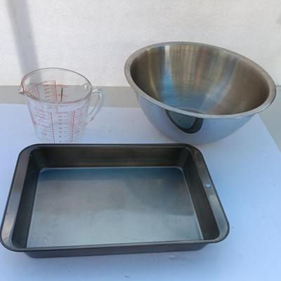 Large stainless bowl - Fire King measuring glass - and a cake pan