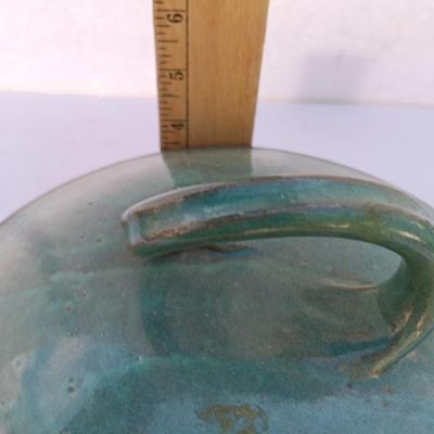 Beautiful clay Pottery Bowl with twisted handled lid