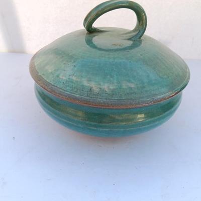 Beautiful clay Pottery Bowl with twisted handled lid