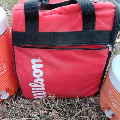 Wilson Soft sided cooler bag with two different sized Rubbermaid GOTT cooler beverage dispensers