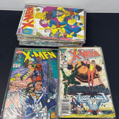 24 Vintage XMen Comics in Plastic Protectors