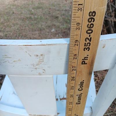 Antique wooden chair with small inlayed design top end table