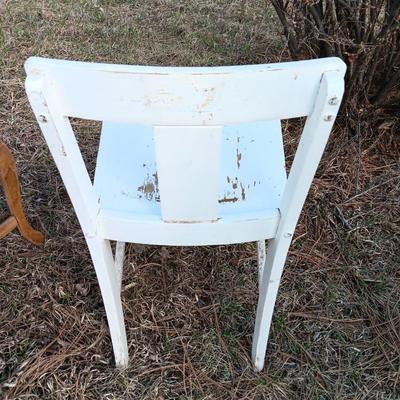 Antique wooden chair with small inlayed design top end table
