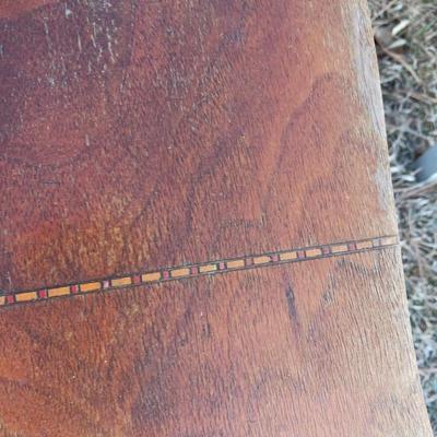Antique wooden chair with small inlayed design top end table