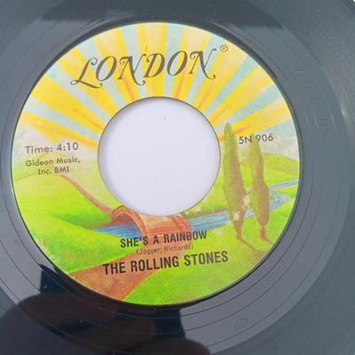 Four 45 LP Records -The rolling stones - The Doobie Brothers - The Beatles - and Elton John