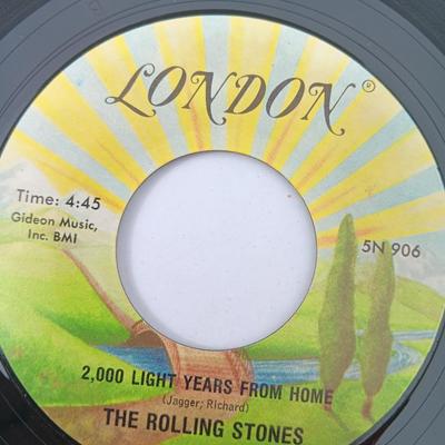 Four 45 LP Records -The rolling stones - The Doobie Brothers - The Beatles - and Elton John