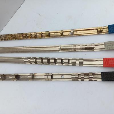 Four Craftsman Socket Storage organizing rods
