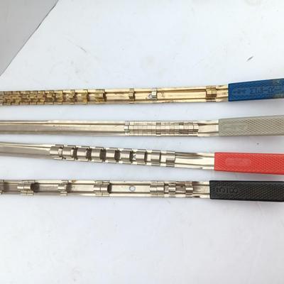 Four Craftsman Socket Storage organizing rods