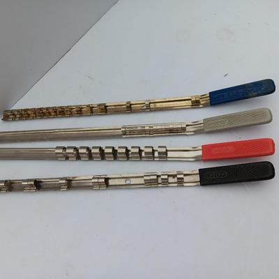 Four Craftsman Socket Storage organizing rods