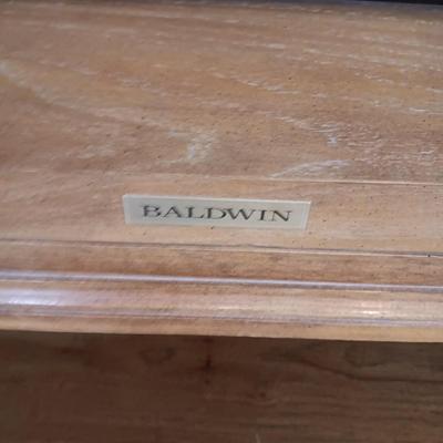BALDWIN ACROSONIC PIANO ON CASTERS W/BENCH AND SHEET MUSIC