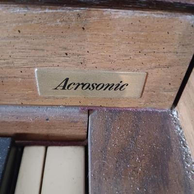 BALDWIN ACROSONIC PIANO ON CASTERS W/BENCH AND SHEET MUSIC