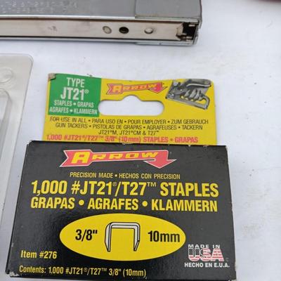 Variety of hand Tools - Stapler with staples - pliers - and 25-foot tape measure