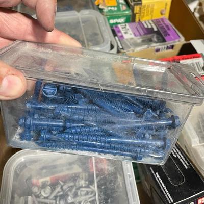 1 Box of misc. screws, anchor bolts over a dozen boxes/bags