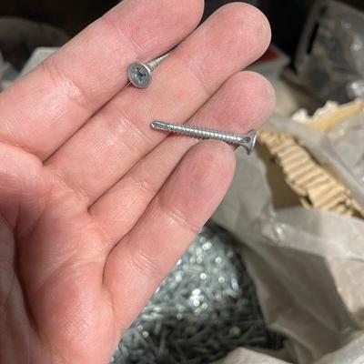 Box of New Drywall Screws - half full but still looks like thousands