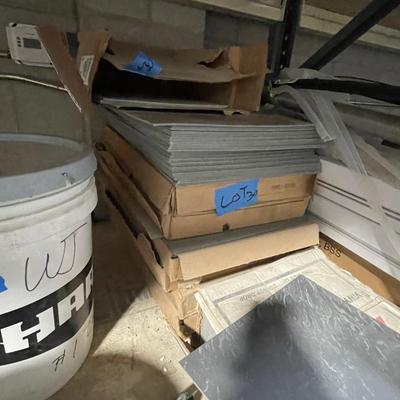 Lot of about 8 boxes of Gray Square ceramic Flooring Tiles