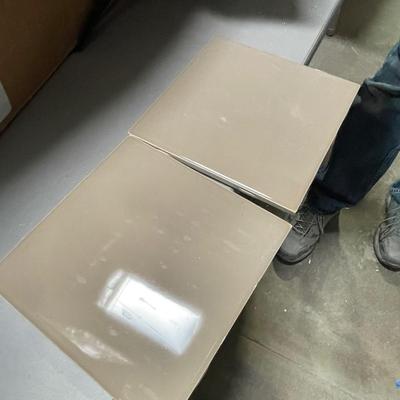 2 and a 1/2 Boxes of 6" x 6" Brown Tiles