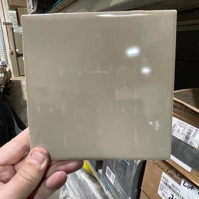 2 and a 1/2 Boxes of 6" x 6" Brown Tiles