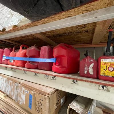 GAS CANS - 9 mostly larger various sized red plastic ones - All for 1 money