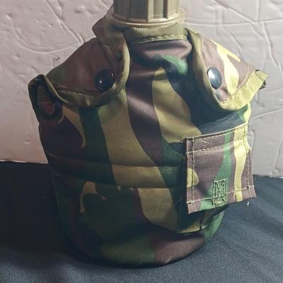 Military canteen with Military issued bags / pouches and a Citizen Quartz watch with a camo band