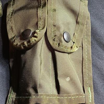 Military canteen with Military issued bags / pouches and a Citizen Quartz watch with a camo band