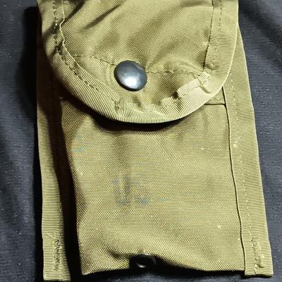 Military canteen with Military issued bags / pouches and a Citizen Quartz watch with a camo band