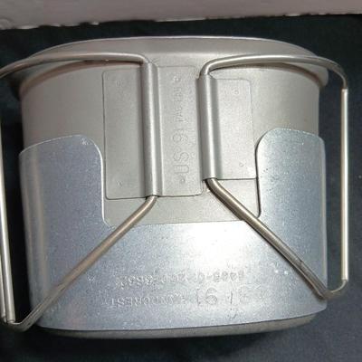 Military canteen with Military issued bags / pouches and a Citizen Quartz watch with a camo band