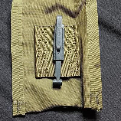 Military canteen with Military issued bags / pouches and a Citizen Quartz watch with a camo band