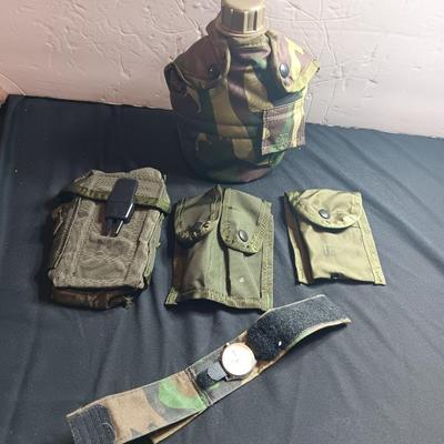 Military canteen with Military issued bags / pouches and a Citizen Quartz watch with a camo band