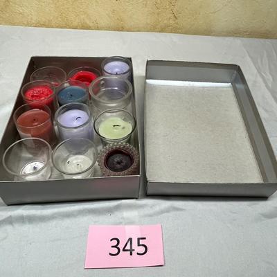 Tin of votives and jars