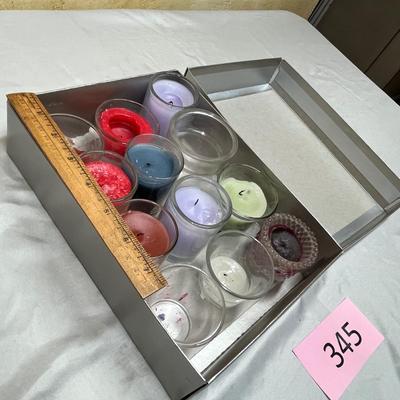 Tin of votives and jars